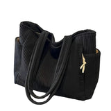 LIORANE™ – RIBBET SHOPPINGTASKE MED EKSKLUSIV SNØREDETALJE