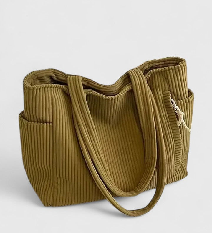 LIORANE™ – RIBBET SHOPPINGTASKE MED EKSKLUSIV SNØREDETALJE