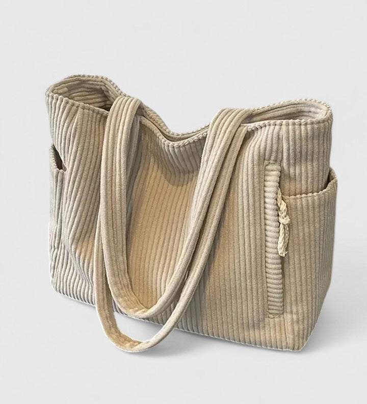 LIORANE™ – RIBBET SHOPPINGTASKE MED EKSKLUSIV SNØREDETALJE